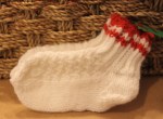 Hand knit socks and mittens by Maggie Hauki